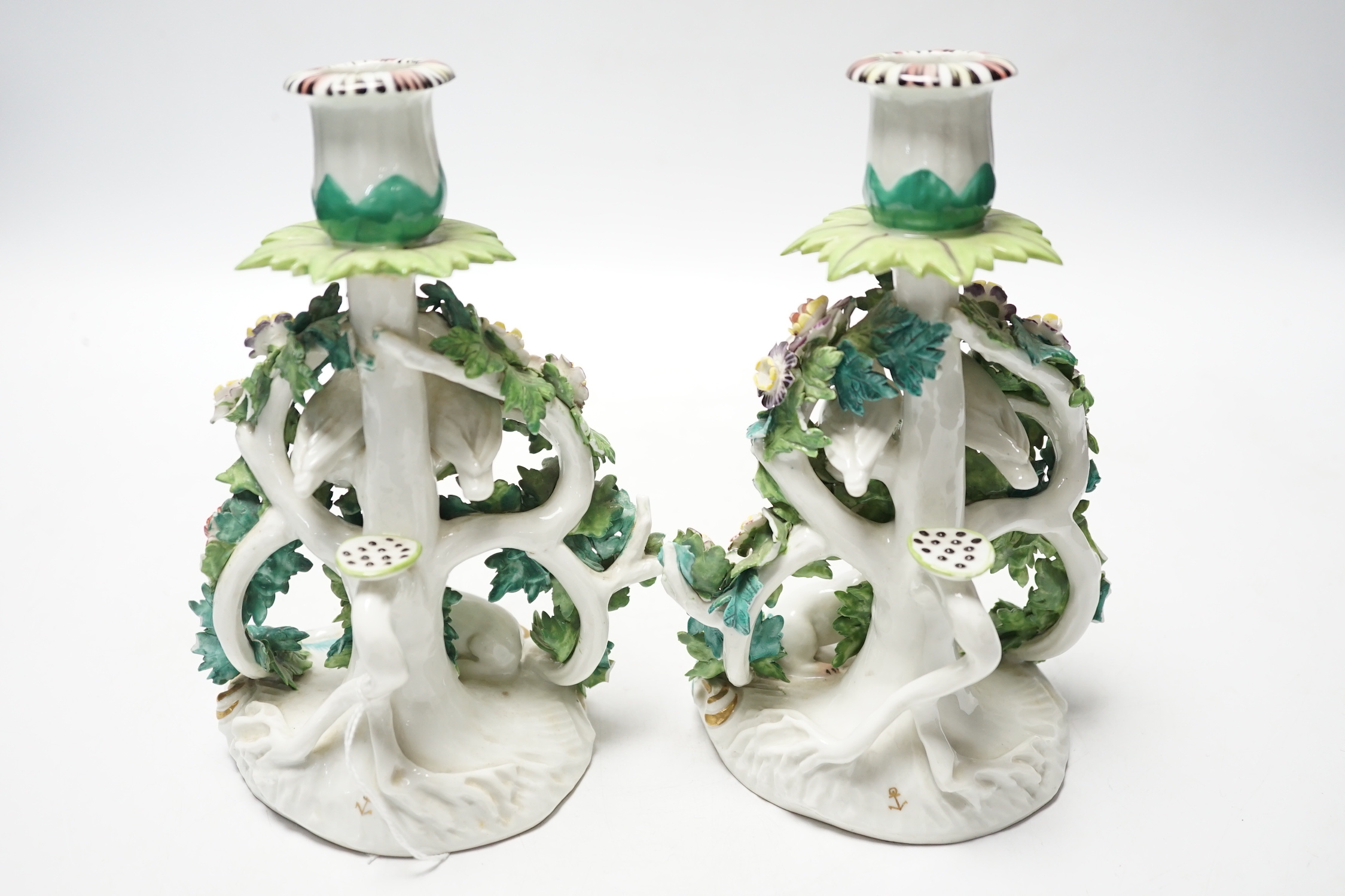 A pair of Samson porcelain chambersticks, in Derby style, with floral encrusted decoration, 19cm high